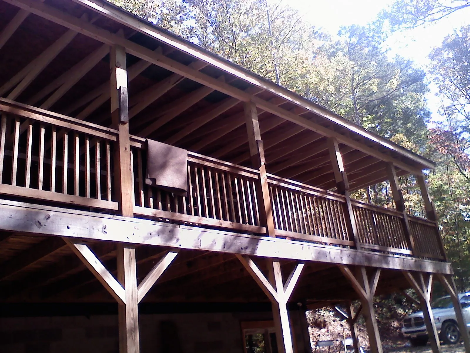 Timber framing under a new elevated porch and deck — Roof Leak Repair in Exline by Roofing Brothers